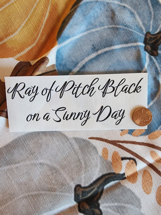 Ray of Pitch Black on a Sunny Day Sticker